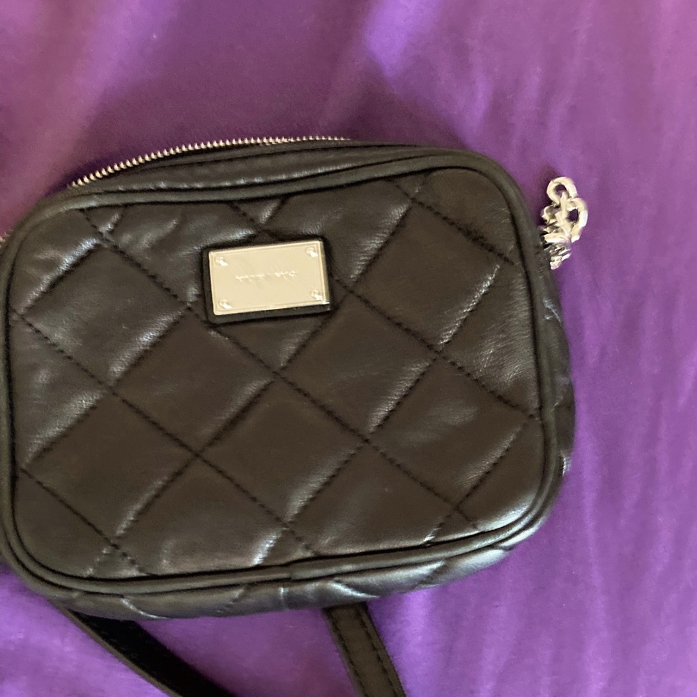 Black strap Michael Kors purse